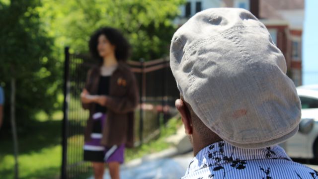 Designer Cedric Michael Cox watching the Youth Apprentice Presentation.