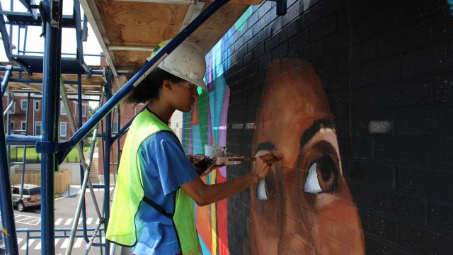 Youth Apprentice Marin Emanuel painting.