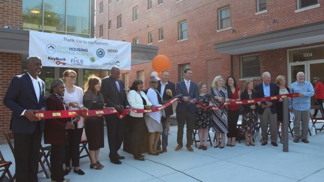 Ribbon cutting for Manse building.